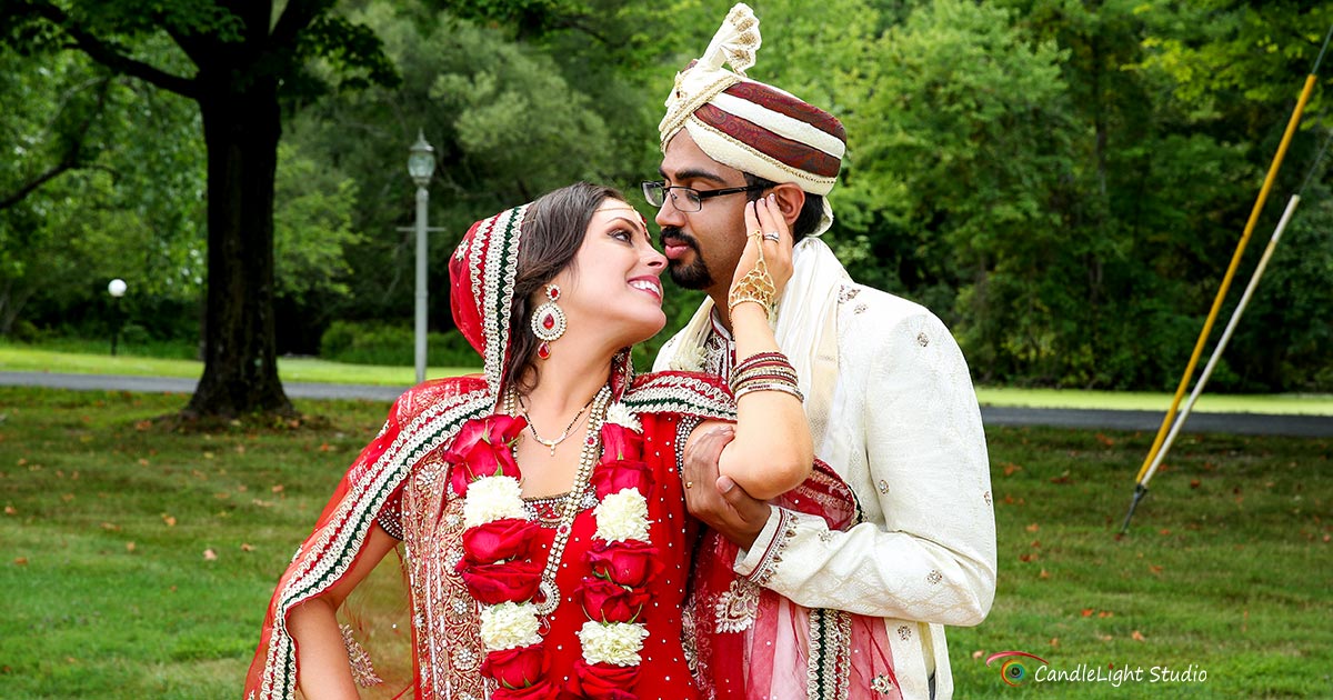 Indian couple in traditional attire sharing a moment